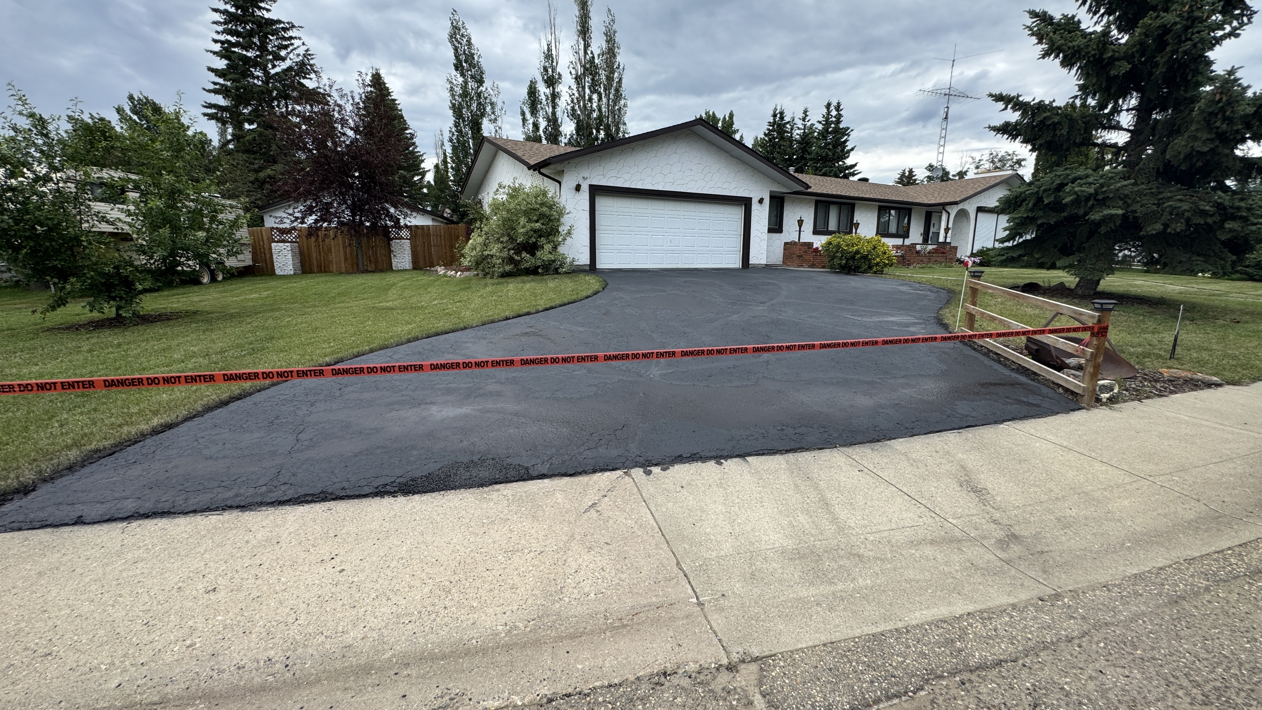 Freshly sealcoated driveway in Trochu, AB